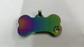 Rainbow plated titanium steel bone shaped pet ID tag with cutout paw print design - Colorful