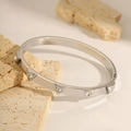 Minimalist silver stainless steel open bangle featuring geometric triangle zircon studs - Steel Triangle Bangle