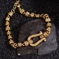 Vintage-Goldarmband in U-Form mit aufwendigen floralen Reliefmustern für Damen - Gold