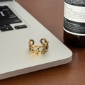 Retro gold Cuban chain ring with embossed floral pattern shown on a laptop surface - Thick Chain Link Engraved Style (170213)