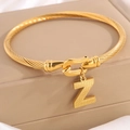Gouden gedraaide armband met letter Z hanger en getextureerde puntpatronen voor dames - Gouden Armband Letter Z