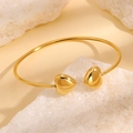 Bracelet jonc ouvert en acier inoxydable doré avec breloques cœurs minimalistes - Bracelet jonc cœur lisse doré