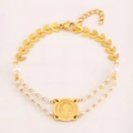 Élégant bracelet en acier titane doré avec médaille de St Benoît et double rang de perles - Style Or Perle Médaille Saint-Benoît