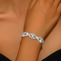 Luxury silver-plated tennis bracelet featuring wave links with sparkling cubic zirconia - Bracelet (746)