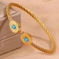 Bracelet torsadé en acier doré avec pierre de turquoise ovale sur les deux extrémités - Modèle corde torsadée ouverte / Or Turquoise