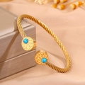 Bracelet jonc torsadé doré avec gravure d'étoile et perles turquoise élégantes - Style Rond Rayon de Soleil Bleu