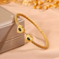 Golden stainless steel cable bracelet featuring heart charms with black stones - Heart Wave Black Turquoise (SZ841-1-1)