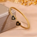 Gold twisted wire bangle with heart charms and black enamel star detail for women - Black Heart Star (SZ844-1-1)