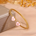 Gold stainless steel cable twisted bangle featuring pink enamel heart-shaped charms - Pink Heart Star (SZ844-1-1)