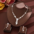 Elegant rhinestone jewelry set featuring butterfly pendant necklace and tassel earrings - White