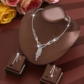 Luxurious silver jewelry set featuring purple flower necklace and long fringe earrings - Purple