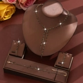 Elegant gold-tone jewelry set with black rhinestones and long tassel Y-necklace - Gold Black Necklace Earrings Bracelet Set