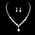 Macro detail of silver-tone bridal necklace set with pear-shaped zircon drops and rhinestones - Necklace Earrings Two Piece Set (863) / Silver