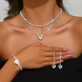 Elegante conjunto de joyas de corazón plateado con collar, pulsera y pendientes - Collar, Pendientes y Pulsera (1514) / Plateado