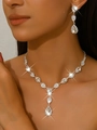 Detail of elegant silver crystal necklace and teardrop earrings on model for wedding - Necklace & Earrings Set (1662) / White