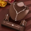 Exquisite rose gold bridal jewelry set with sparkling pavé zircon necklace and earrings - Necklace, Earrings and Bracelet / Rose Gold