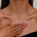 Elegantes Brautschmuck-Set in Roségold mit funkelnden Strasssteinen und langen Ohrringen - 1264 Roségold