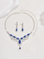 Macro detail of tear-drop crystal jewelry set with navy blue stones and silver plating - 1341 Blue
