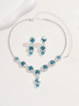 Detail of silver bridal necklace and earrings set featuring navy blue crystal accents - 498 Sea Blue