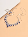 Detail of bridal jewelry set with navy blue marquise stones and crystals on warm background - Necklace And Earrings / Royal Blue Style(1463)