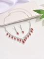 Detailed close-up of V-shaped silver necklace and earrings with red marquise crystals - Necklace And Earrings / Red Style(1463)