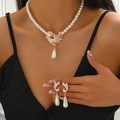 Elegant pearl jewelry set with rose gold phoenix feather pendant and matching earrings - Necklace & Earrings Set (1006) / Rose Gold