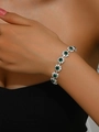 Women's silver-tone bracelet featuring six emerald green flower charms for gift - Green Bracelet