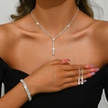 Close-up of sparkling double-row diamond jewelry set with long necklace and earrings - White Style (446+428-2) / Necklace Earrings Elastic Bracelet