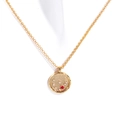 18K gold plated necklace with a hammered zodiac pendant featuring red and white zircons - Capricorn-Gold/Ruby Red