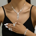 Elegant 4-piece silver jewelry set with fringe necklace, rhinestone ring and earrings - Necklace + Earrings + Bracelet + Ring