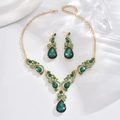 Elegant gold-plated jewelry set with emerald green teardrop crystals and matching earrings - Gold Green