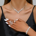 Sparkling silver bridal jewelry set with V-shaped necklace, bracelet, earrings and ring - Necklace Earrings Bracelet Ring Style (774599424-2)