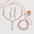 Detailliertes Set aus roségoldenem Brautschmuck mit funkelnder Halskette und Ohrringen - Roségold