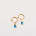 Boucles d'oreilles pendantes en or avec pierres précieuses bleues en forme de goutte - Décembre