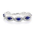 Luxurious silver bracelet featuring marquise-cut blue sapphire crystals in a halo setting - Sapphire Blue