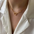 Gold paperclip chain necklace with heart pendant worn on a white satin shirt - Heart Carabiner Paperclip Necklace