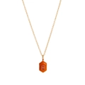 Detail of a gold-plated hexagonal pendant with orange stone and a center red crystal - Hexagon / Orange