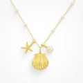Elegant gold shell necklace with natural pearls and starfish charms on a white background - Shell Starfish Necklace