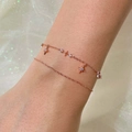 Zweilagiges Damenarmband aus Roségold-Edelstahl mit Sternanhänger und Zirkon - Armband / Roségold