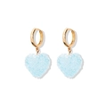 Detail of light blue heart gummy earring with gold hoop and sugar texture finish - Blue Earrings