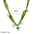 Green silk cord necklace with golden charms like lucky horseshoe, dice and evil eye - Dice - Green