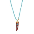 Detail of beaded necklace with light blue stones and red horn pendant with gold cap - Beaded-Blue