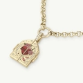 Detailed macro of golden sacred heart pendant with hand-painted roses and crystals - Heart Locket Necklace