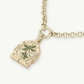 Detail of a vintage gold locket necklace with green dragonfly and crescent moon design - Plant Locket Necklace