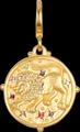 Golden Leo zodiac pendant with colorful rhinestones on a matte gold relief surface - Leo