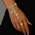 Detailed view of elegant gold hand harness with sparkling rhinestones on black background - Radial Connection Style (1001) / Gold