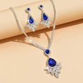 Luxe zilveren halsketting en oorbellen set met blauwe edelstenen voor bruiloften - Saffierblauw