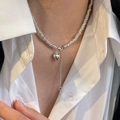 Elegant silver heart necklace with spiral chain on model wearing white shirt - Spiral Spring Texture Glossy Heart Necklace (XL1589)