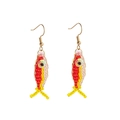 Handmade colorful beaded fish drop earrings with vibrant red and yellow finish - Red and Yellow Fish Earrings