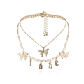 Detailed close-up of gold layered necklace with LOVE letters and butterfly charms - Butterfly Letter Necklace Gold-LOVE (0477) / Gold
